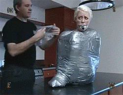 Mummified girl hogtie tape