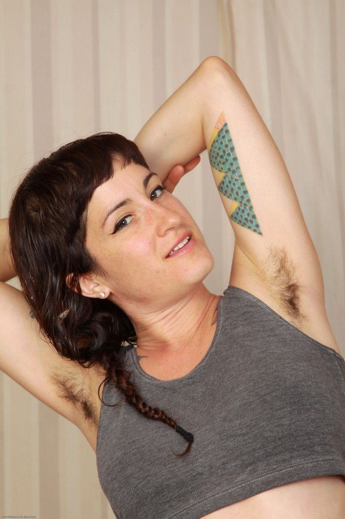 Tattooed hairy pussy